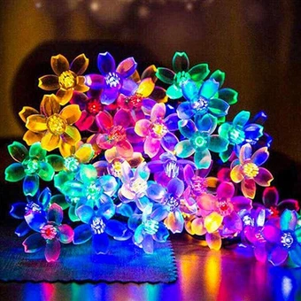 Luz de cordas em forma de flor da primavera